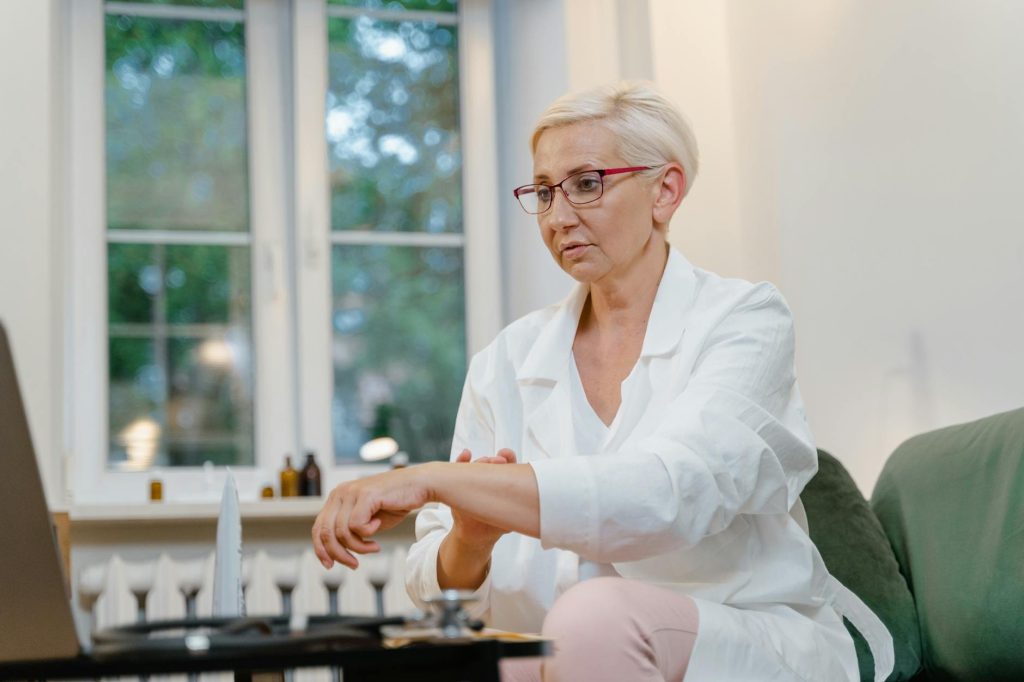a female doctor giving online consultation